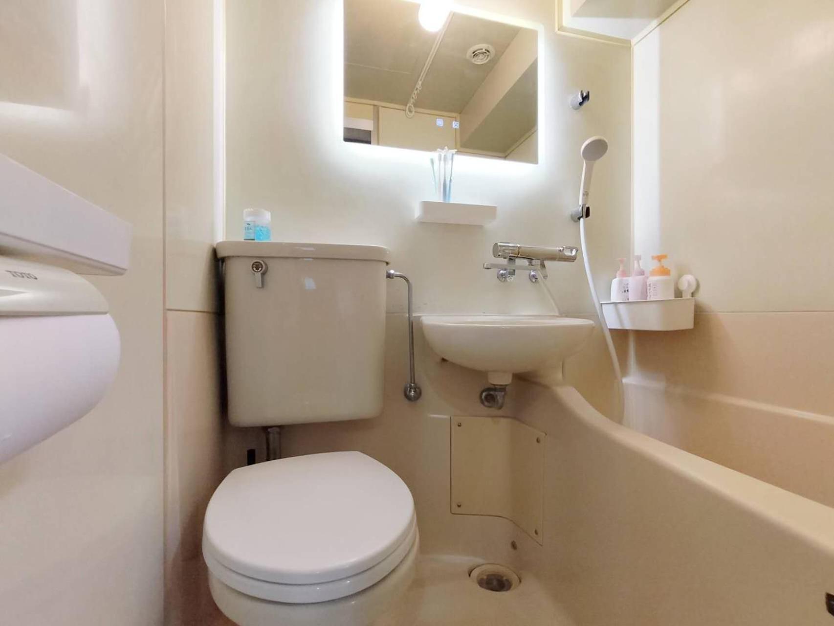 新宿 シングルルーム 複数ベッド、キッチン、ダイニングテーブル完備、短期、中期滞在に最適。 Apartment Tokyo